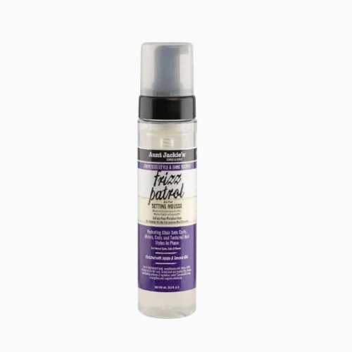 Foam mousse bottle with purple label on a white background