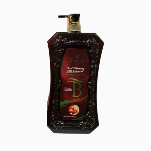 Bottle of skin whitening product with pump on a white background