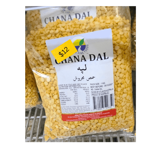 Packaged chana dal with a price tag on a metal rack