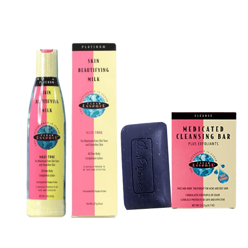 Set of skincare products including a bottle, box, and bar on a white background