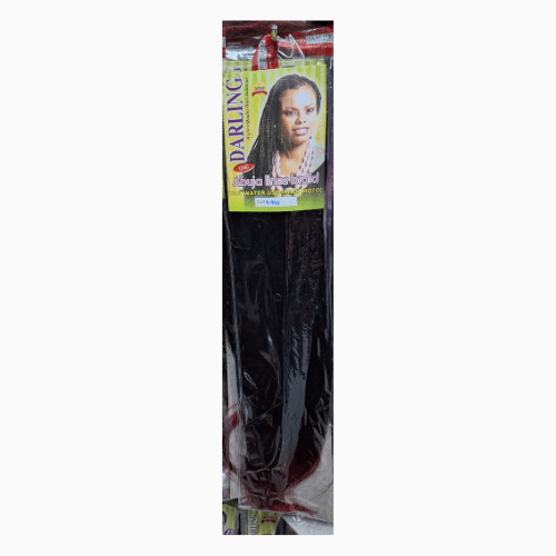Packaged hair extensions with a brand label on a white background