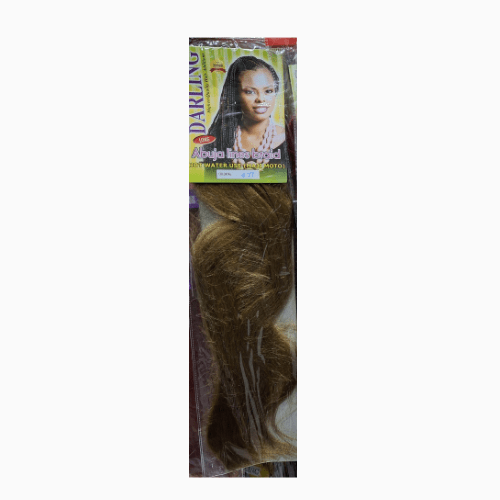 Packaged hair extensions with a model image on the label against a white background