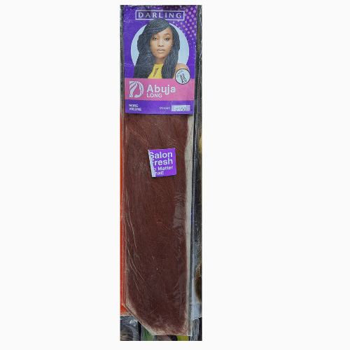 Packaged hair extensions with purple and white packaging on a white background