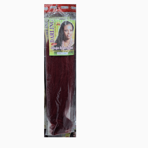 Packaged hair extensions with a visible brand label on a white background