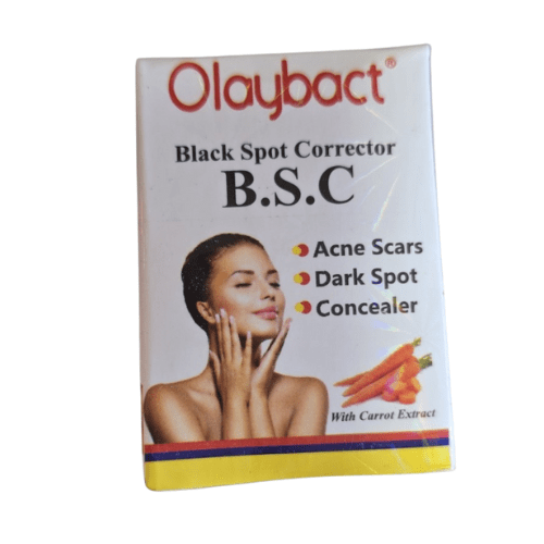 Olaybact Black Spot Corrector packaging with a woman's face and carrot extract illustration on a white background.