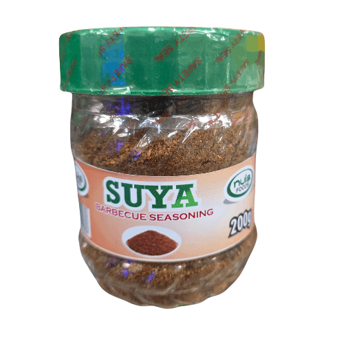 Jar of Suya barbecue seasoning with a green lid on a white background